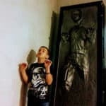 Image of boy copying Han Solo frozen in carbonite at Naples Archaeology Museum. www.captivatingcompass.com