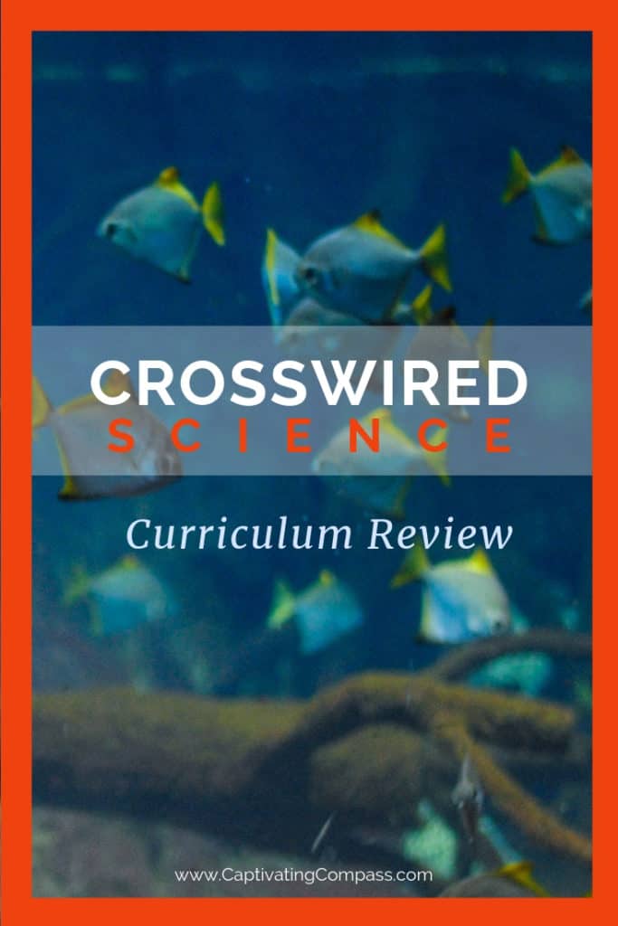 image of blue & yellow fish in aquarium with text overlay Crosswired Science a Curriculum review by www.CaptivatingCompass.com