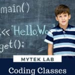 image of boy infront of chalkboard with computer coding. Textoverlay says MYTEK LAB Coding lasses Kids Love from www.CaptivatingCompass.com